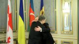 Порошенко — Квирикашвили: Мы делаем все, чтобы не отстать от Грузии