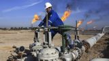 Ирак в руках США: Армия уходит, контроль над нефтяными деньгами остается