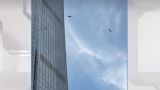 Самолет врезался в небоскреб в Пекине и рассыпался — видео