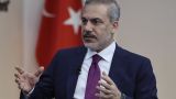 Глава турецкой дипломатии совершит визит в Россию