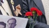 В Молдавии полиция подбила штрафы за ношение георгиевской ленты в День Победы